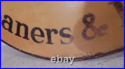 A vintage enamel advertising sign double sided A vintage enamel advertising sign double sided