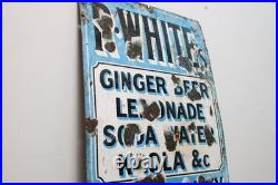 A vintage mid-century R. Whites enamel drinks advertising sign