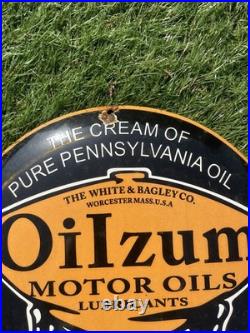 Vintage Enamel Oilzum Motor Oils Sign
