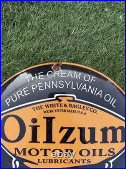 Vintage Enamel Oilzum Motor Oils Sign