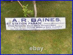 Vintage antique Enamel Advertising Sign Optician Binoculars Harrogate camera Old