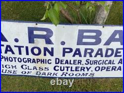 Vintage antique Enamel Advertising Sign Optician Binoculars Harrogate camera Old