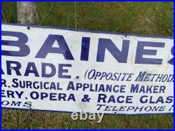 Vintage antique Enamel Advertising Sign Optician Binoculars Harrogate camera Old