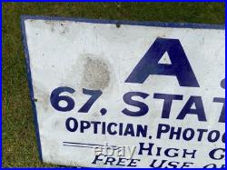 Vintage antique Enamel Advertising Sign Optician Binoculars Harrogate camera Old