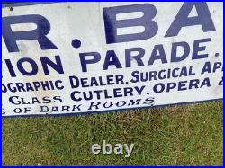 Vintage antique Enamel Advertising Sign Optician Binoculars Harrogate camera Old
