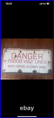 Vintage enamel High Voltage warning sign. 66000 volts. 60x30cm approx